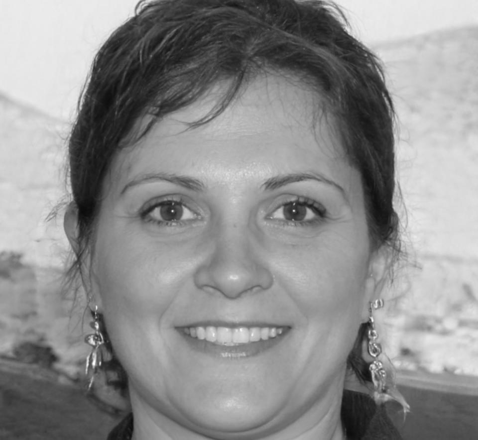 Professional headshot of Elena Kowalski, investment analysis specialist and workshop leader